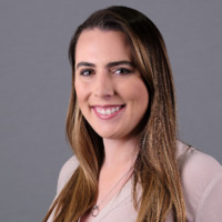 A headshot of Kate Reynolds.