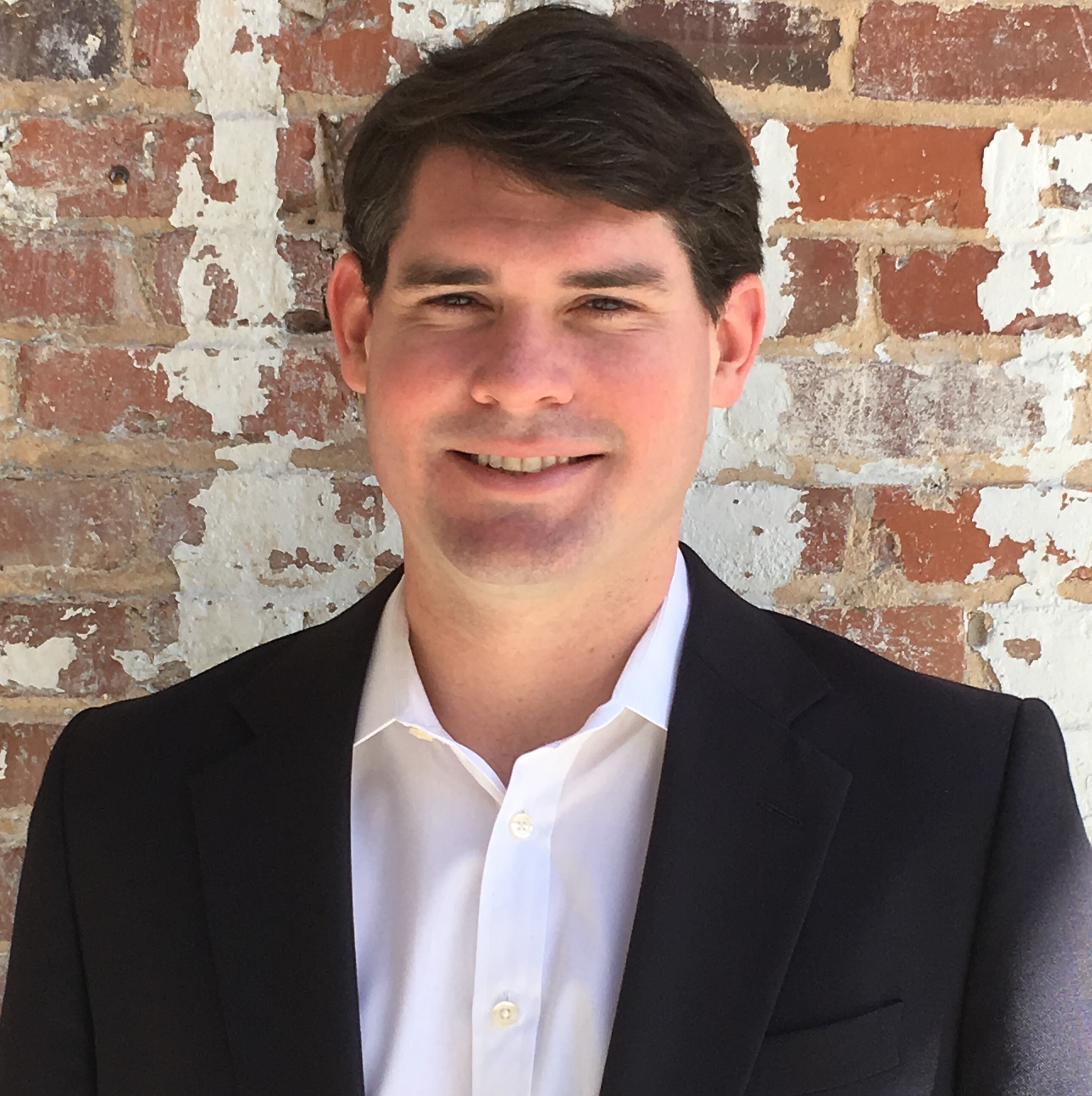 A headshot of Greg Schlachter.